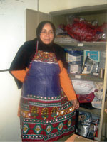 Nouria Naji displays the trainees sincere efforts by proudly wearing a piece of their unique handiwork.