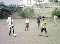 Football matches were the main sport event during camps. Youth from Taiz exercising before a match.
