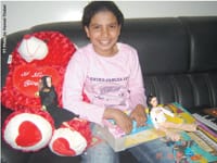 Nojoud reciving gifts in Yemen Times office in Sanaa.