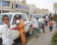 Children selling goods at a traffic light in Sanaa. Participants at the Third Youth Conference expressed their concern about increasing poverty and the risks young Arabs face on the streets.