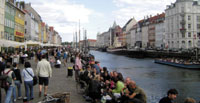 Copenhagens waterside restaurants and cafs are alive with people.