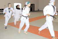 Most of the girls practice in indoor halls and are usually from Aden or Taiz governorates are the culture there is more open and allows girls to participate in sports more publically. (YT Photo By Amira Al-Sharif)