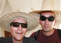 Ed and David with farming hats on.