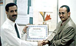 Mr. Mohammed al-Basha Marketing Manager receives the honor certificate on behalf of the Company