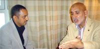 Dr. Hany El-Bana (right) talking to the Managing Editor of Yemen Times.